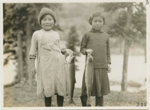 Image of Miriam Flowers and Susie with trout [Them Days says Miriam Brown & Maggie Brail]